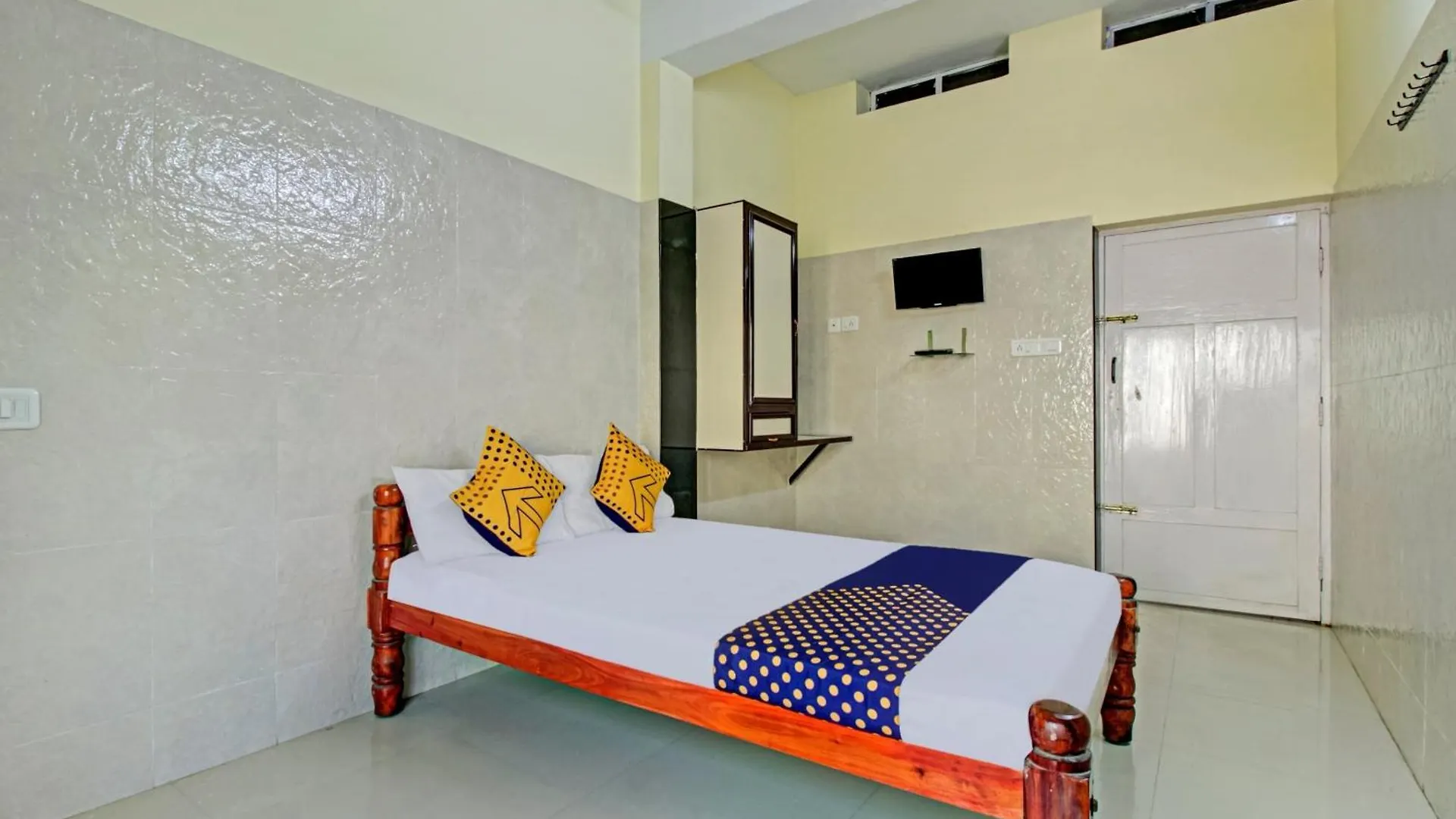 Spot On J P Tourist Home Kollam